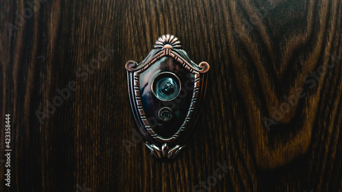 door lens peephole on lwooden. antique style