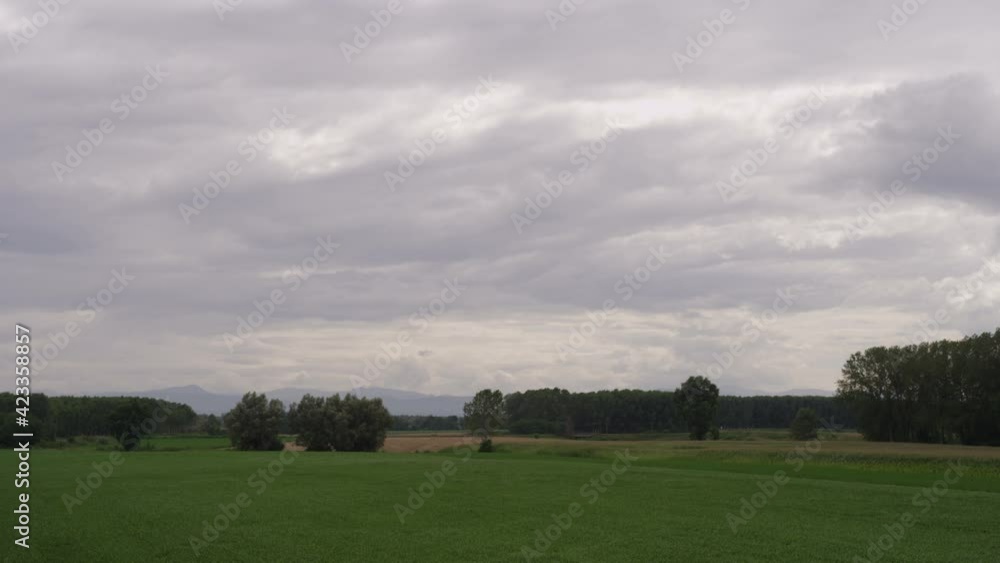 Cloudy sky timelapse over italian countryside land Cloudy sky timelapse over italian countryside land