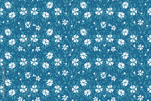 Floral ditsy daisy seamless pattern in millefleurs and liberty style. Vintage tiny floral print for pastel colored. Suitable for childrens lingerie and clothing, summer dresses Repeating doodle vector