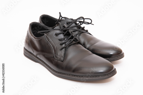 Mens black shoes on a white background