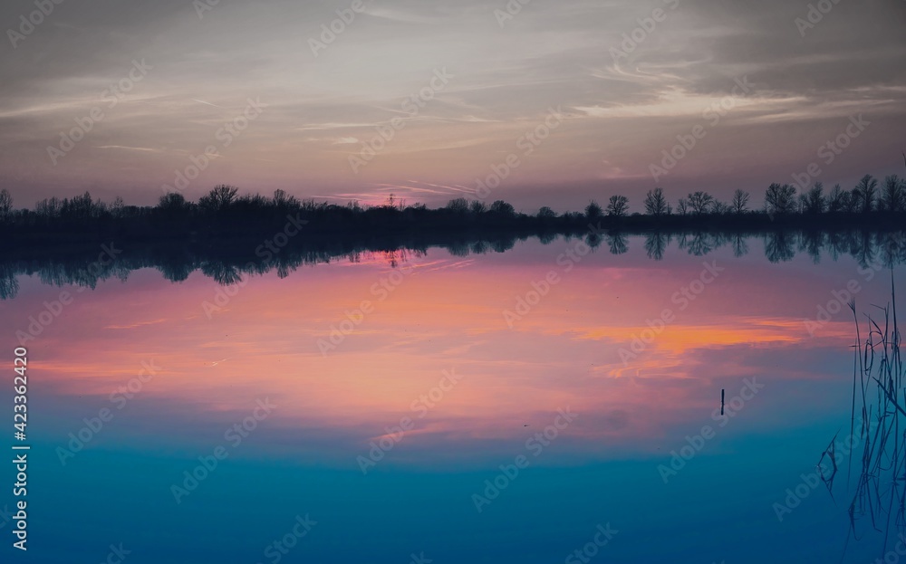 Natural gravel lake. Photographed at sunset.