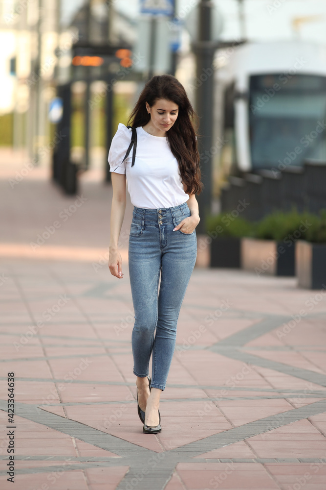 young fashionable woman in the cityscape young fashionable woman in the cityscape