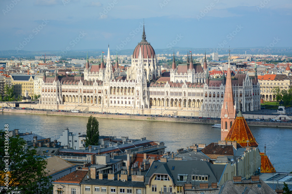 Budapest, Hungary - June 20, 2019: View to Hungarian Parliament Building from Castle District located on Buda side of the city