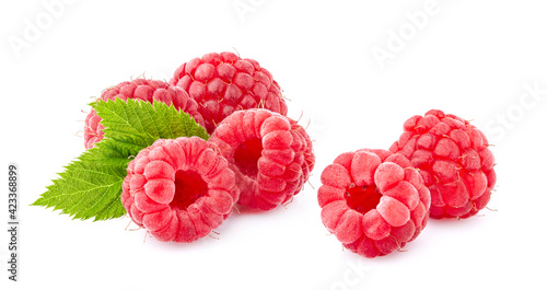 Raspberries with leaves Isolated on White Background. Ripe berries closeup.