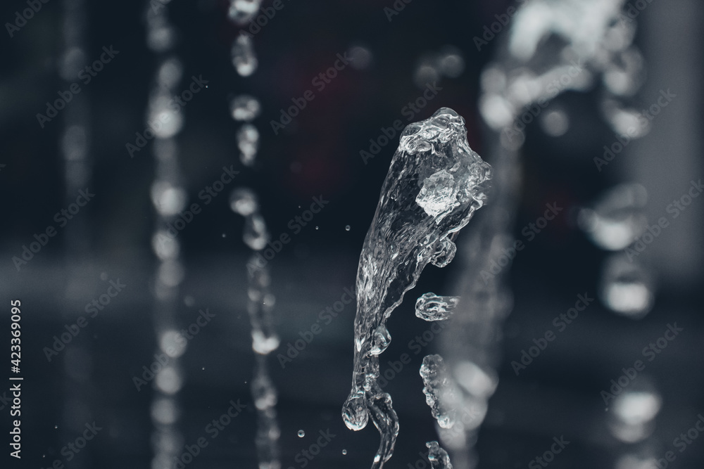 Water droplets flying from a water fountain. splashing water - Beautiful water wallpapers