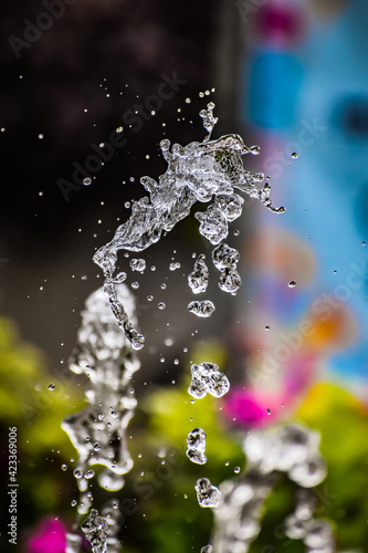Water droplets flying from a water fountain. splashing water - Beautiful water wallpapers