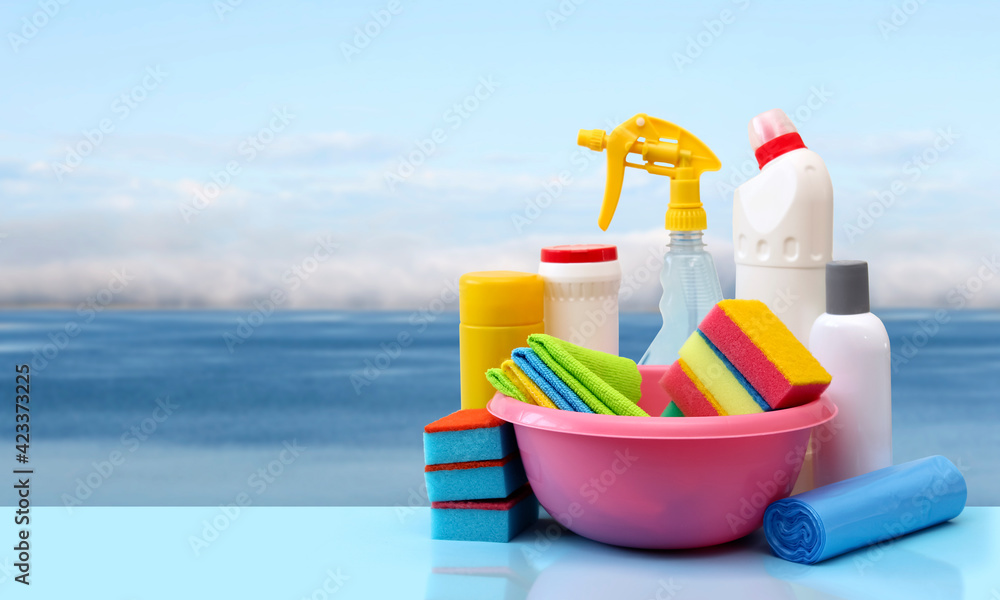 Cleaning products on a fresh blue background of the sea. Cleaning products on a fresh blue background of the sea.