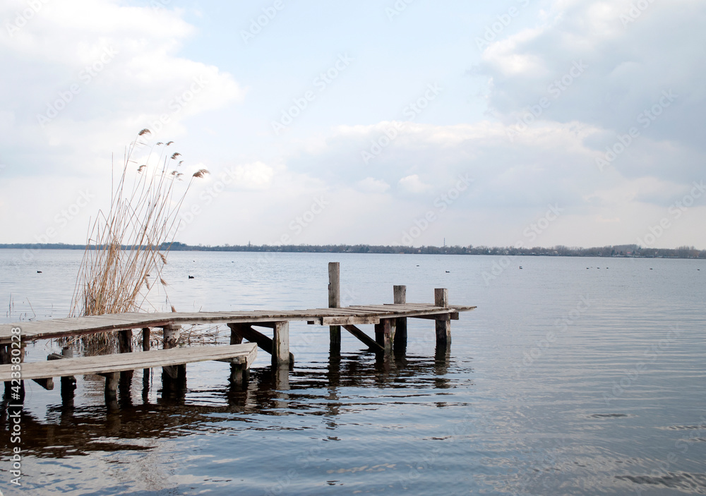 Dnieper river and fishing pier.
Landscape photo of the river. Dnieper river and fishing pier.
Landscape photo of the river.