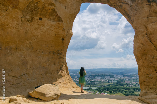 A tourist (girl) standing inside of Ring mount (Gora Kolzo). Kislovodsk, Stavropol Krai, North Caucasus, Russia. photo