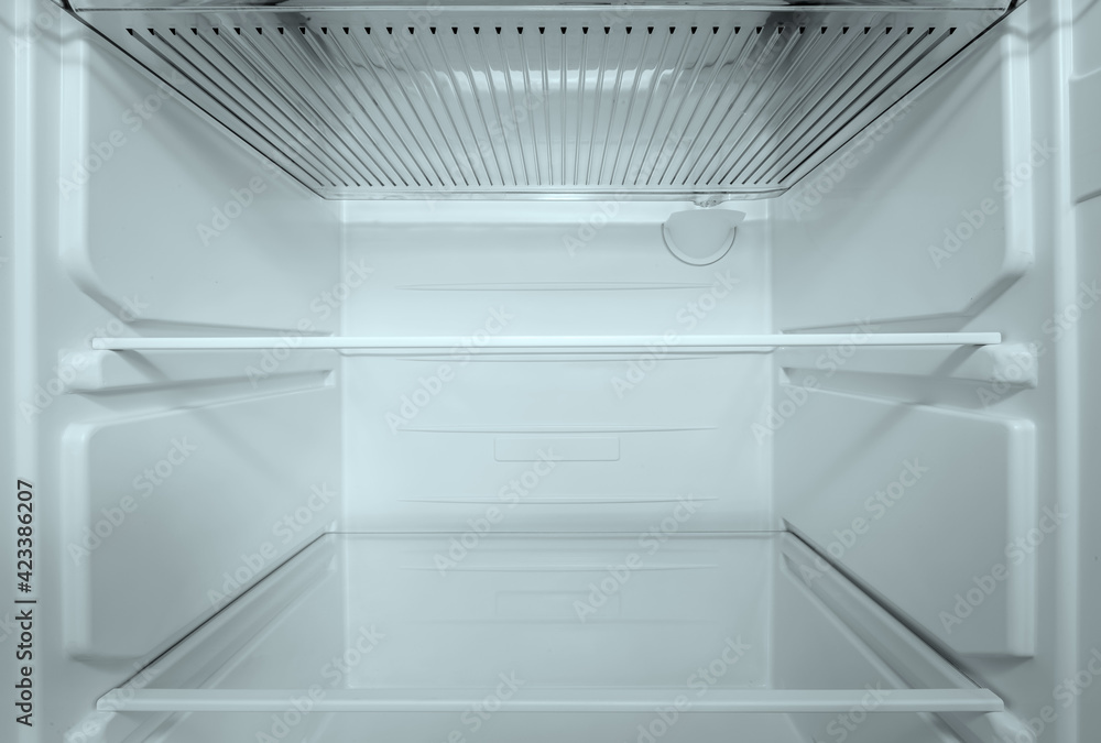 Refrigerator open empty fridge inside interior. close up on empty  refrigerator with door open. New clean refrigerator Stock Photo | Adobe  Stock