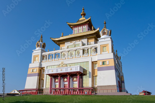 View of Burkhan Bakshin Altan Sume  Golden Temple of Buddha Shakyamuni  on sunny day against blue sky. Elista  Kalmykia  Russia.