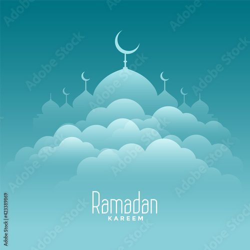 elegant ramadan kareem card with clouds and mosque