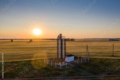 Lighthouse Budaky in the sunset. Colorful landscape. Kurortne, Odessa Oblast, Ukraine photo