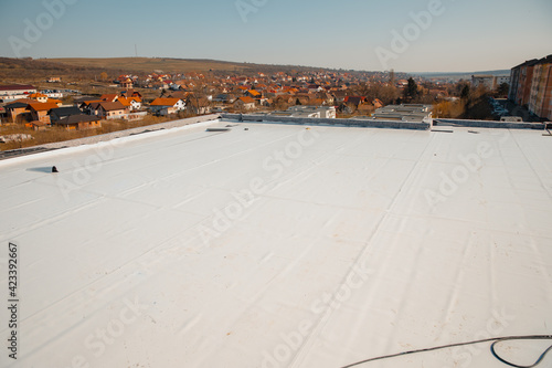 Flat roof with hot air welded pvc membrane waterproofing for ballasted system