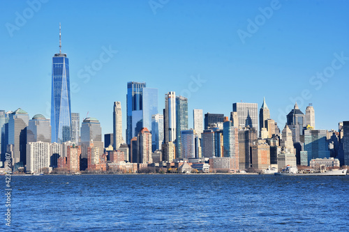 Buildings architecture of Manhattan  New York City seen from Ellis Island  New Jersey  USA.