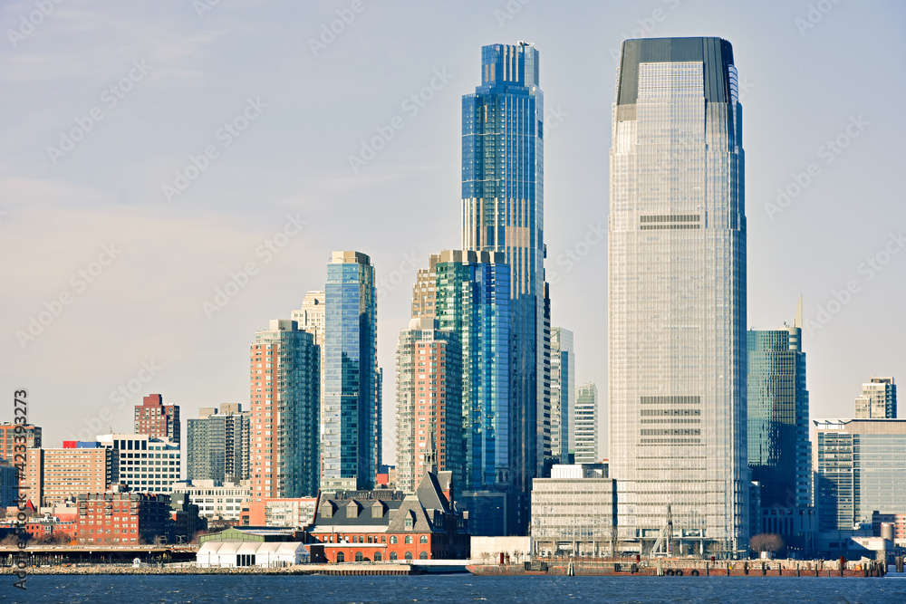Fototapeta premium Buildings architecture of Manhattan seen from ferry boat cruise on Hudson River, New York City, USA.