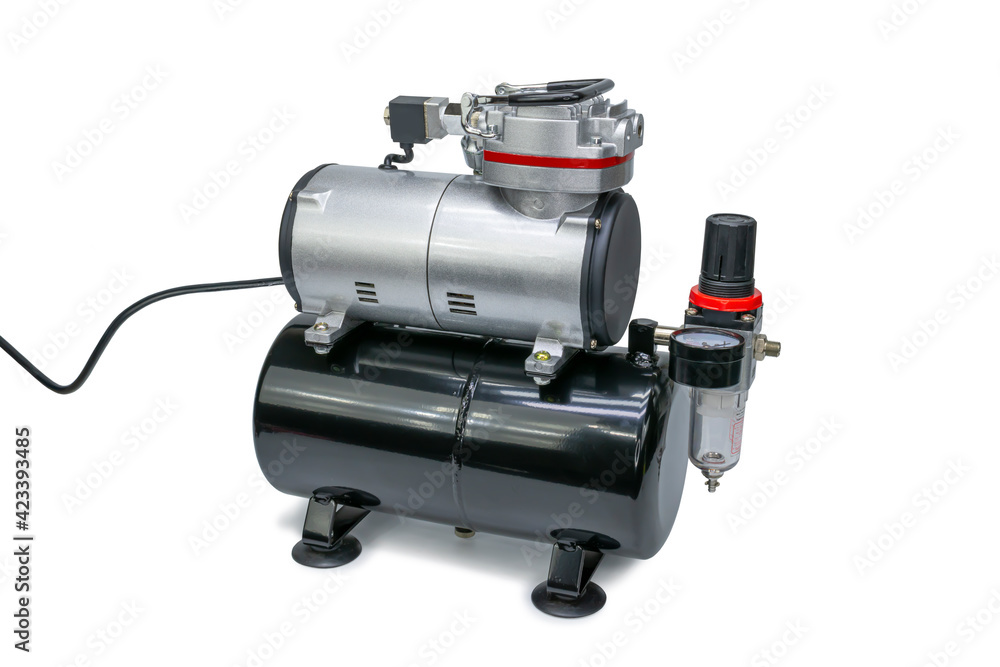 Mini air compressor on isolated white background Mini air compressor on isolated white background