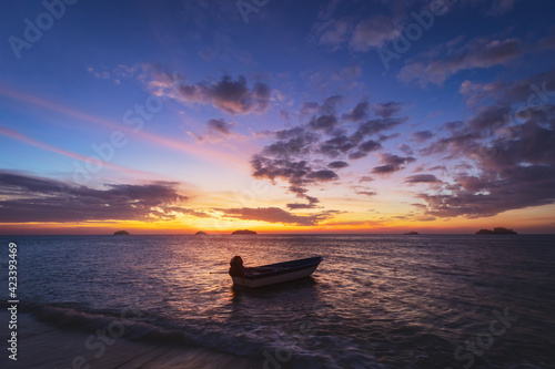 Boat on beach in sunset at Koh Chang Trad Thailand