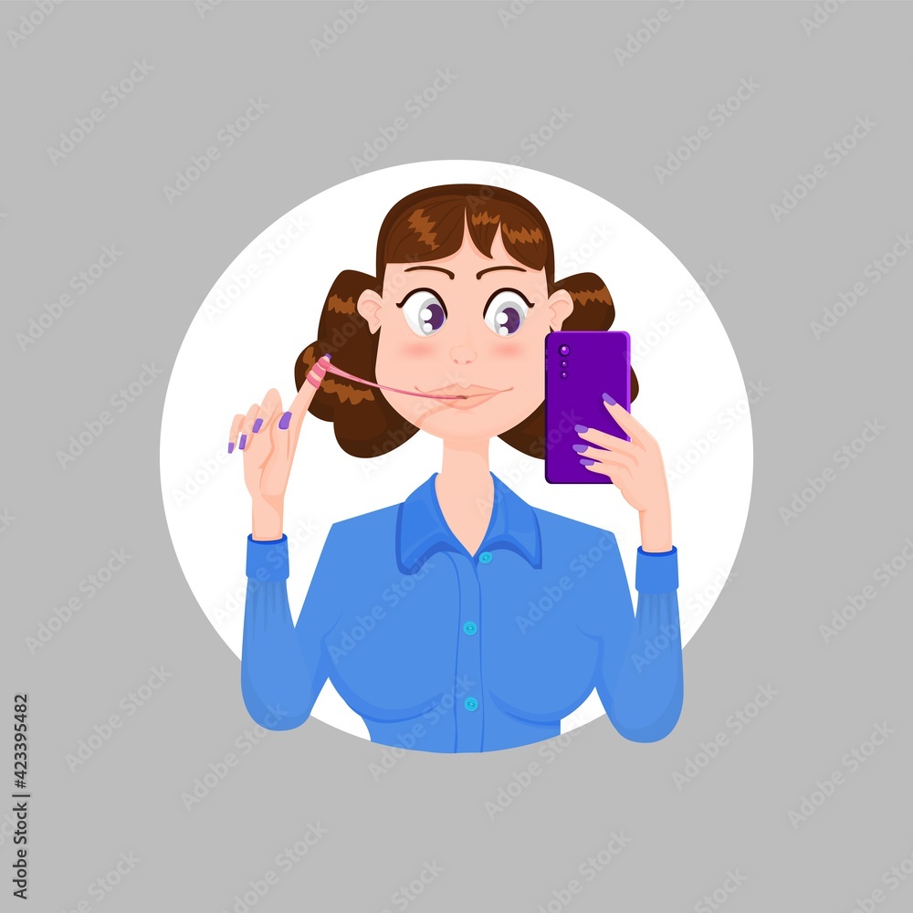 A young woman looks at a smartphone and reels a gum on her finger. A young woman looks at a smartphone and reels a gum on her finger.