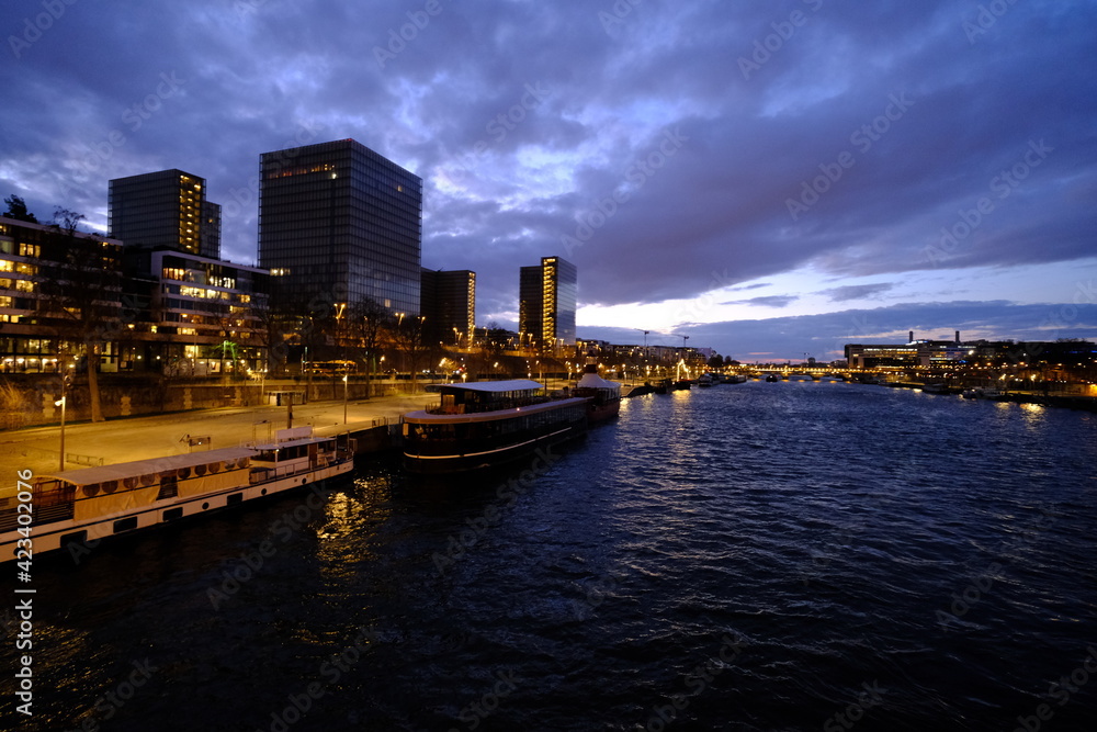 The Seine River and the Mitterand Library in the evening. Paris, march 2021.