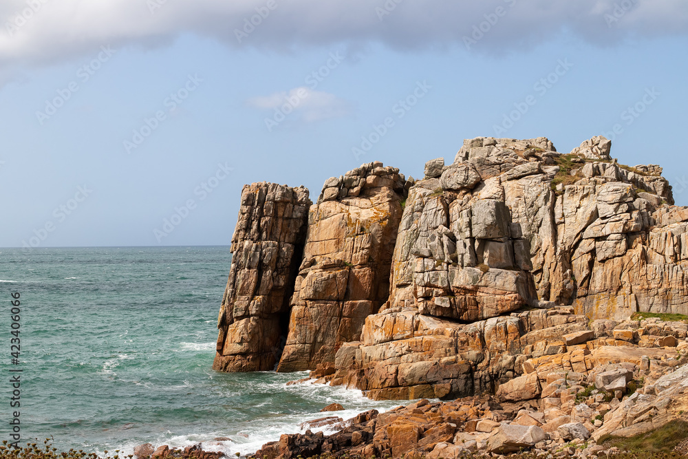 Rocky cliffs on the Pink Granite Coast near Le Gouffre in Brittany
