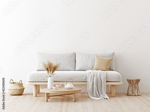 Living room interior wall mockup in warm neutrals with low sofa, dried Pampas grass, caned table, trendy basket and japandi style decor on empty white wall background. 3D rendering, illustration. photo