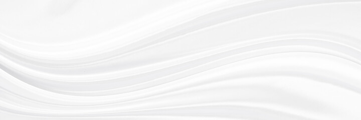 White gray satin texture that is white silver fabric silk panorama background with beautiful soft blur pattern natural.