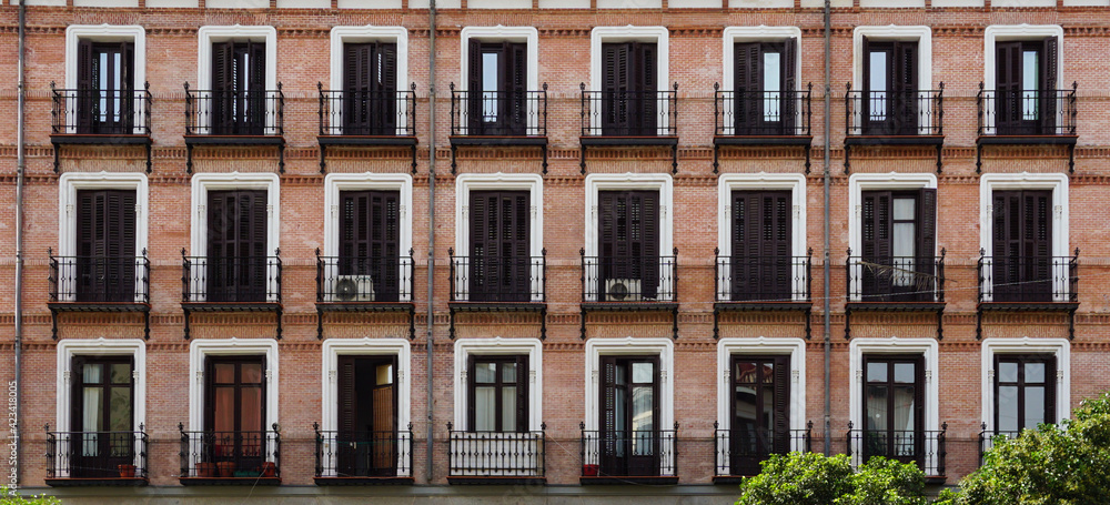 Beautiful balconies on a building in Madrid, Spain