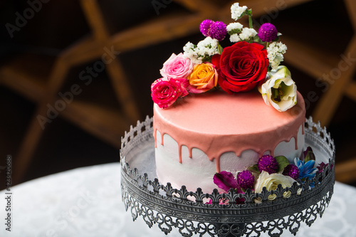Cake decorated with natural flowers