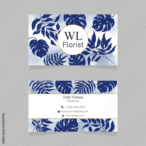 Business card template with blue tropical floral background