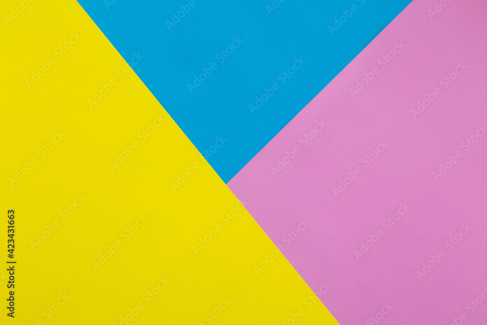 Colorful yellow, blue and pink pastel paper texture background, Geometric flat lay background.