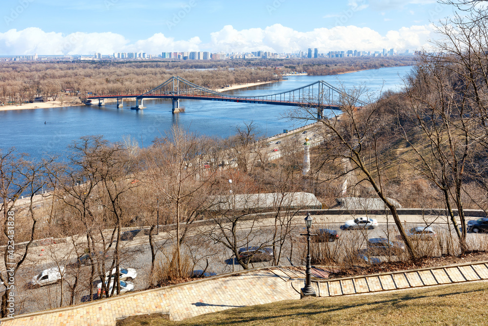 Beautiful landscape of Kyiv in early spring with a view of the Dnipro and the monument to the Magdeburg Law. Beautiful landscape of Kyiv in early spring with a view of the Dnipro and the monument to the Magdeburg Law.