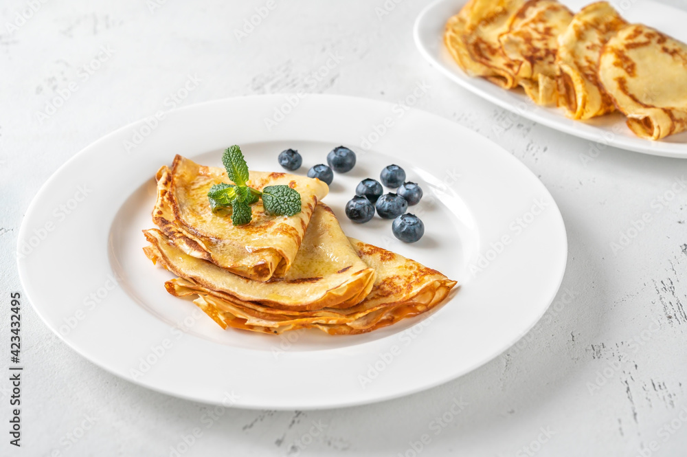 Folded crepes on the plate