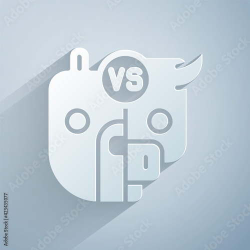 Paper cut Bull and bear symbols of stock market trends icon isolated on grey background. The growing and falling market. Wild Animals. Paper art style. Vector