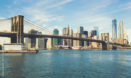 Fototapeta Naklejka Na Ścianę i Meble -  Brooklyn bridge with cityscape of Lower Manhattan skyscrapers skylines bulding New York City. Lower Manhattan is the largest financial district in the world.