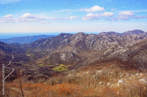  Beautiful mountain landscape. View of mountain range of Dinaric Alps on sunny day in early spring. Bosnia and Herzegovina, Republika Srpska