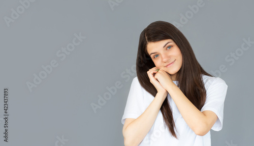 Portrait of beautiful woman posing gesture isolated on gray studio background
