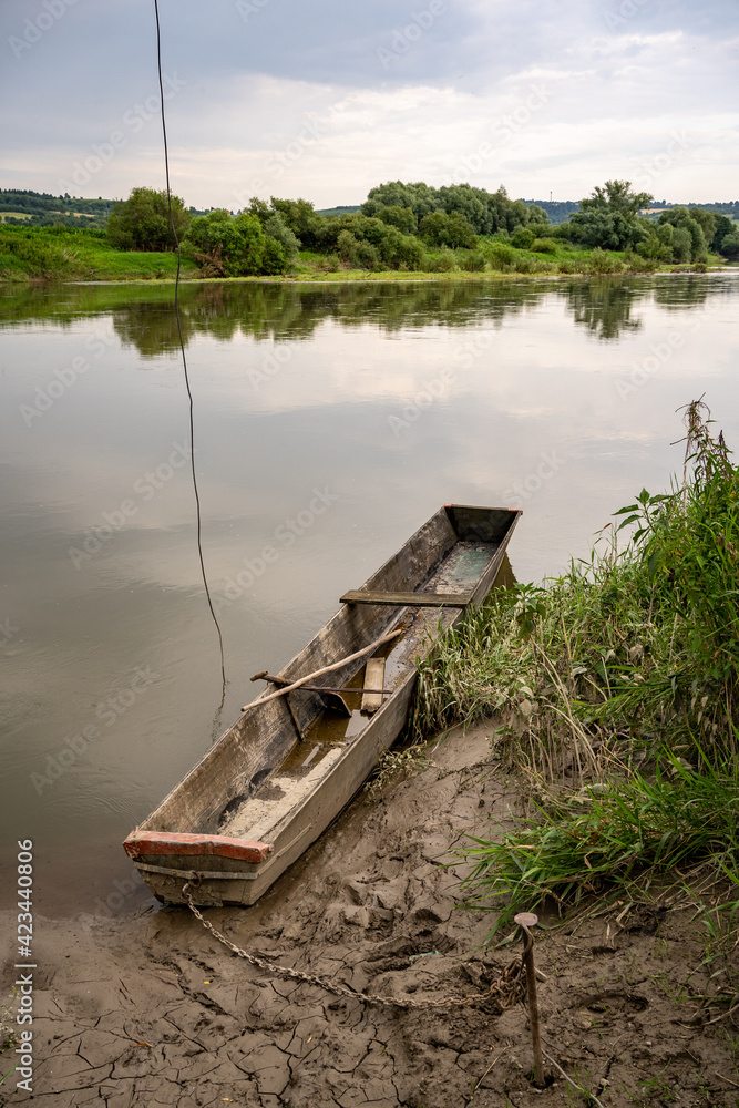 Old wooden boat on the San river, Poland