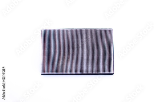 Dirty car air filter requiring replacement. isolated on a white background.