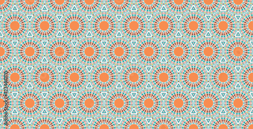 Geometric wallpaper with Moroccan tiles in orange and blue tones