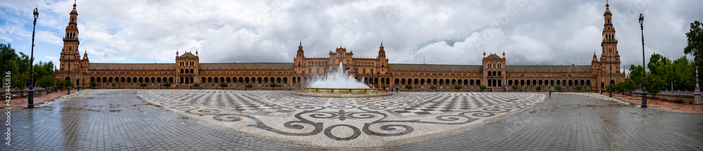 Plaza de Espana in Seville is a perfectly semi circle construct that I captured in this panorama from its equidistant center giving this picture the illusion of a flat building.