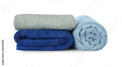 Fresh clean towels for bathroom on white background