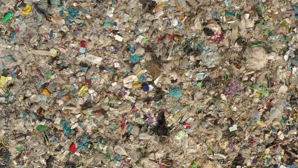 Aerial top drone view of large garbage pile, trash dump, landfill, waste from household dumping site, garbage background. Consumerism and contamination concept
Aerial top drone view of large garbage pile, trash dump, landfill, waste from household dumping site, garbage background. Consumerism and contamination concept
