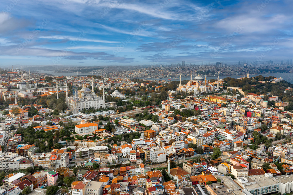Aerial wide cityscape of Istanbul from the european side. Daytime shot bright lighting with both residential and historic mosque views