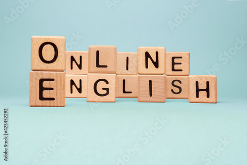 Word Online English letters blocks toy cubes. Speak English Online course icon wooden blocks concept foreign language tutoring. Learning Online English words block wooden cubes concept language course