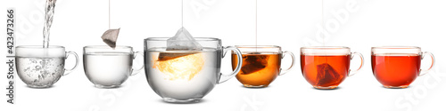 Process of making tea in glass cup on white background