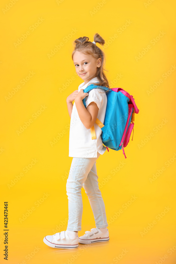 Cute little schoolgirl on color background Cute little schoolgirl on color background