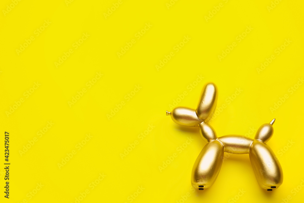 Stylish figurine of balloon dog on color background Stylish figurine of balloon dog on color background