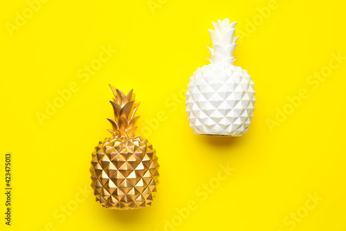 Stylish pineapples on color...