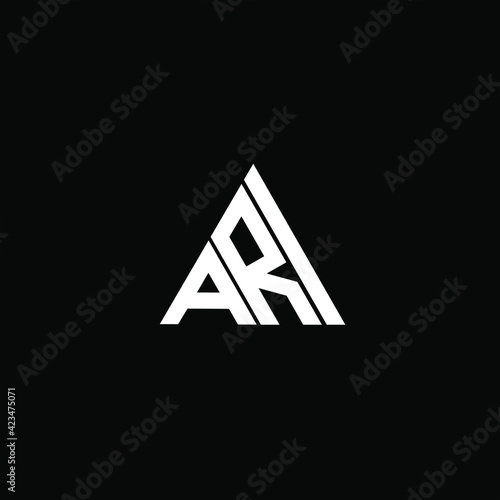 A R I letter logo creative design on black color background. ARI icon photo